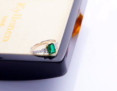 3 Stone Emerald cut Emerald Ring